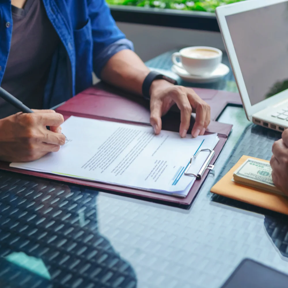 Business team reviewing company documents in a modern office