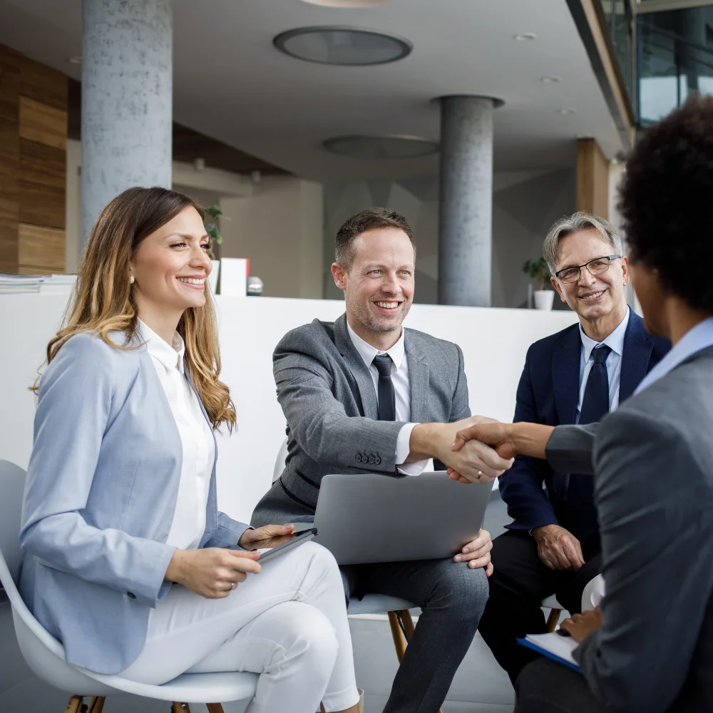 Business team reviewing company documents in a modern office