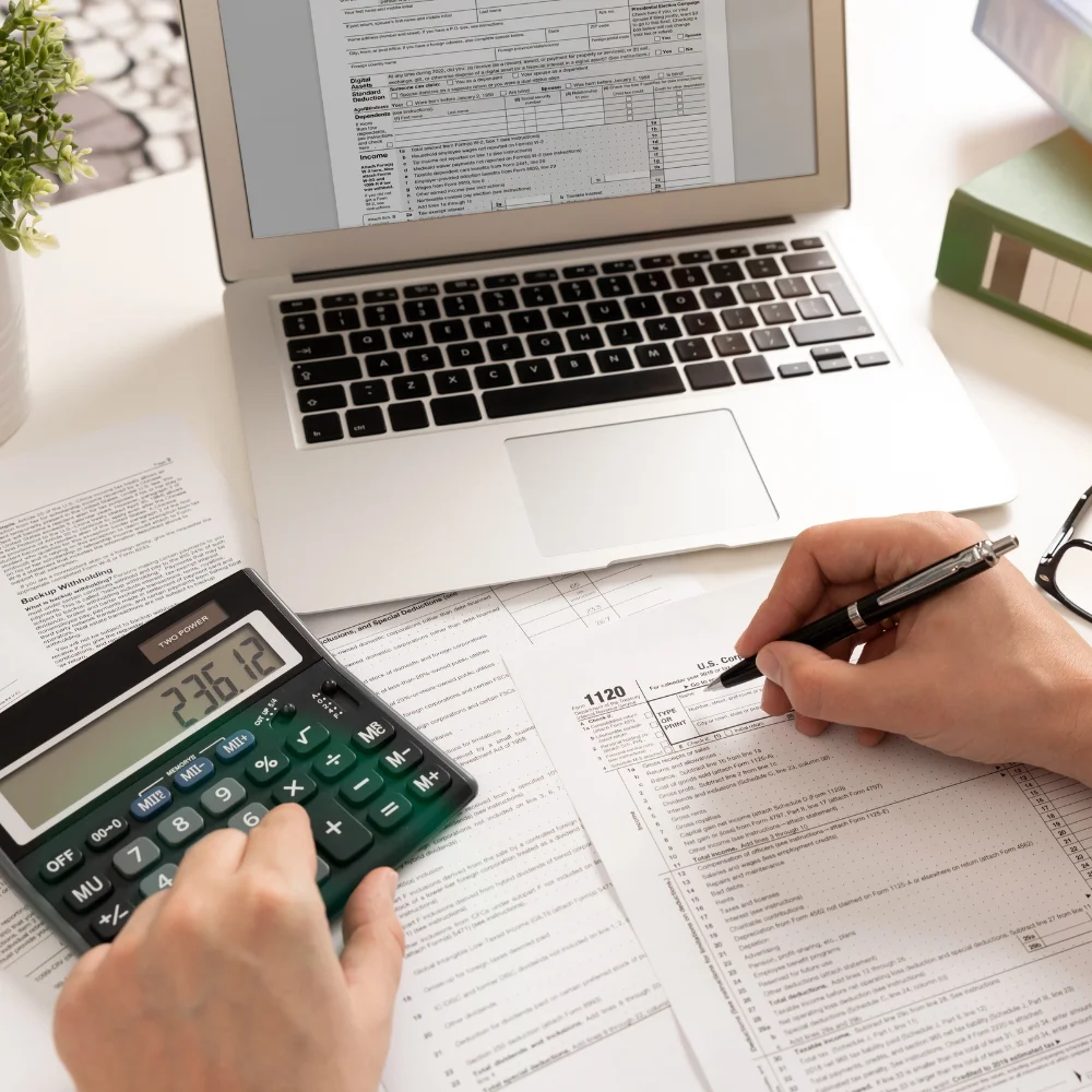 Business team reviewing company registration documents in a modern office