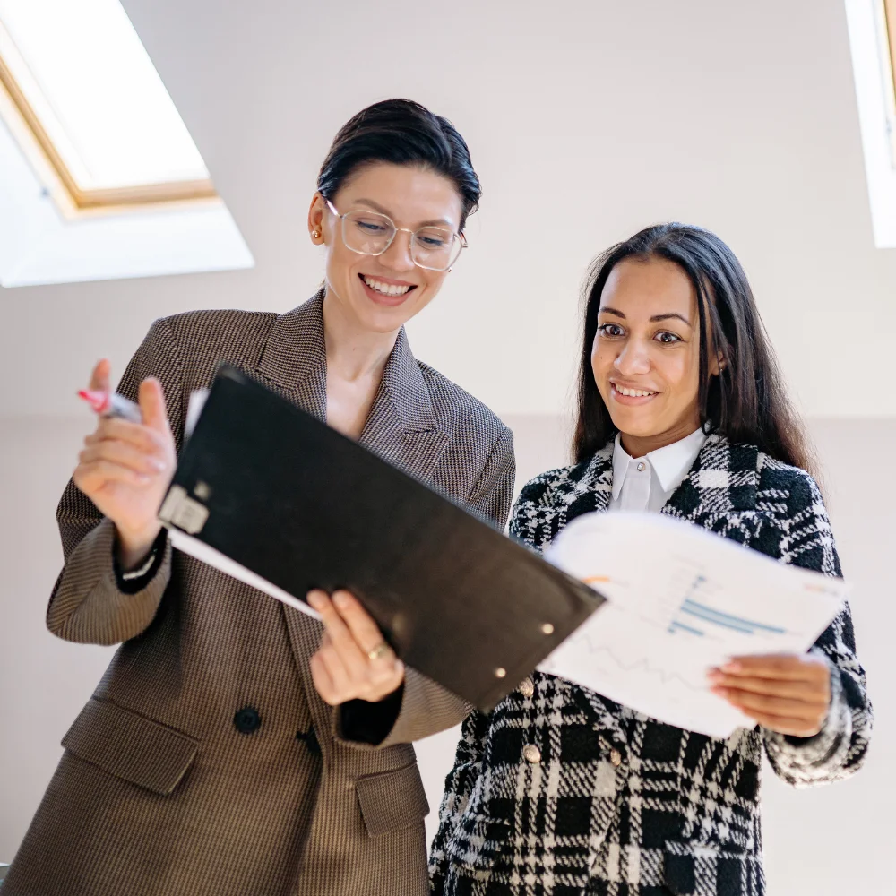 Business team reviewing company documents in a modern office