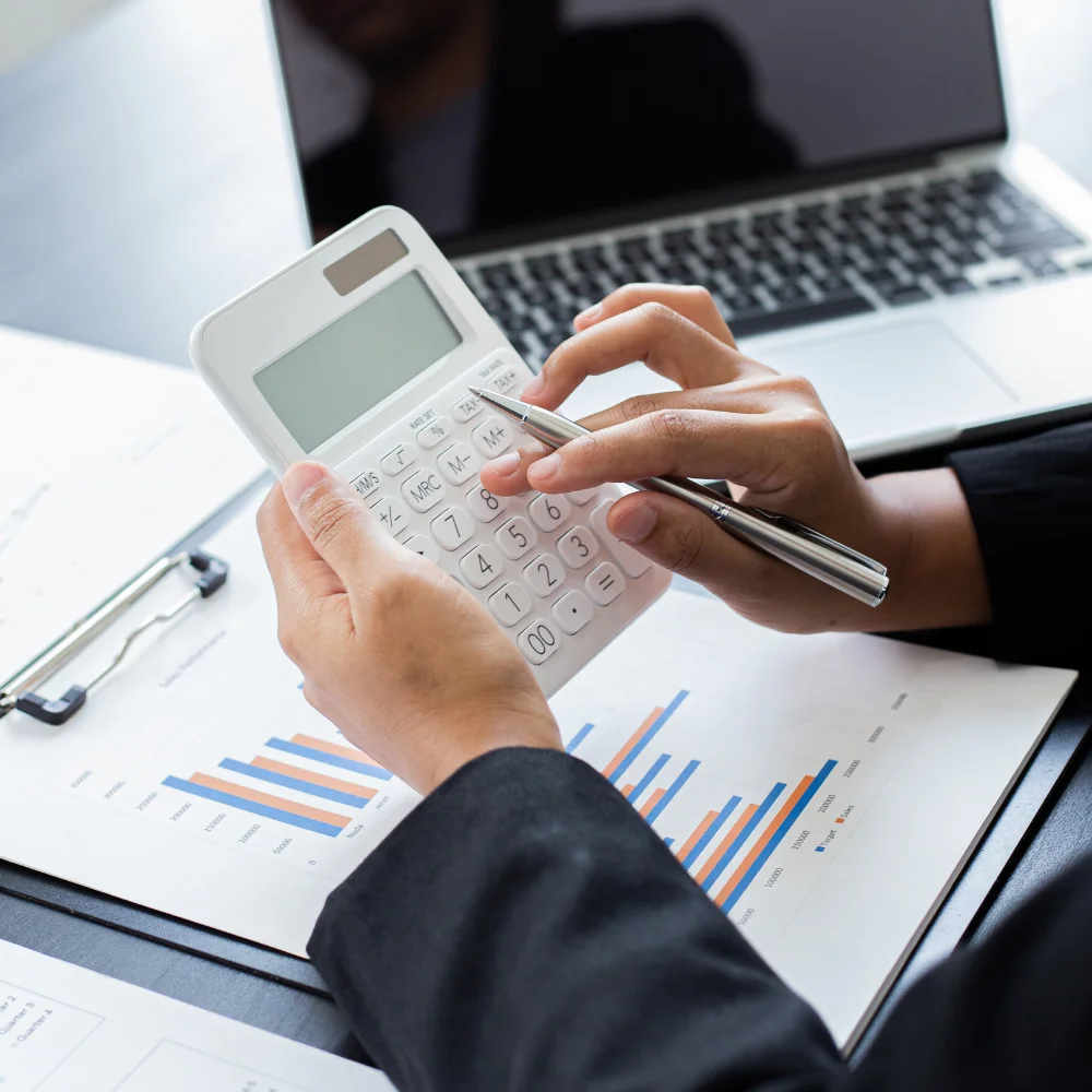 Business team reviewing company registration documents in a modern office