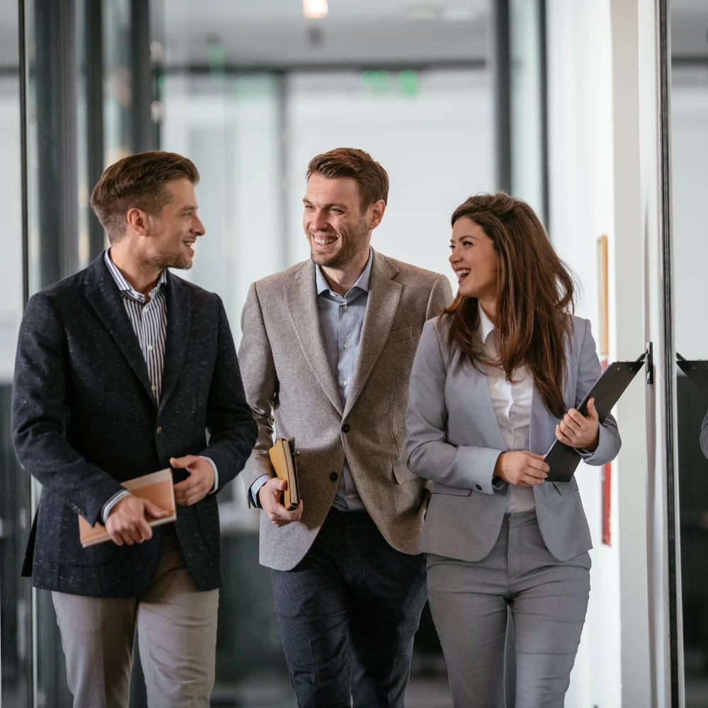 Business team reviewing company documents in a modern office