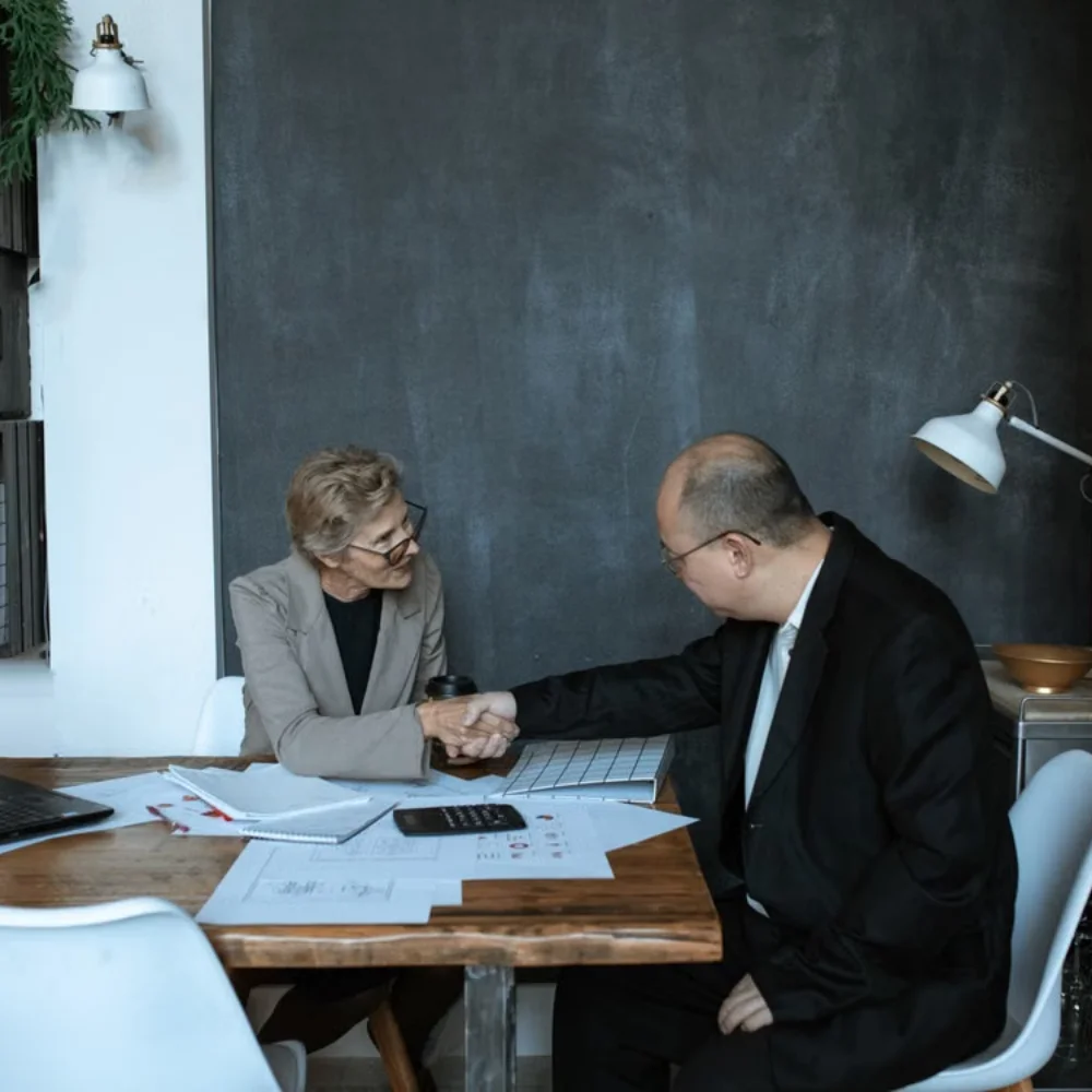 Business team reviewing company documents in a modern office
