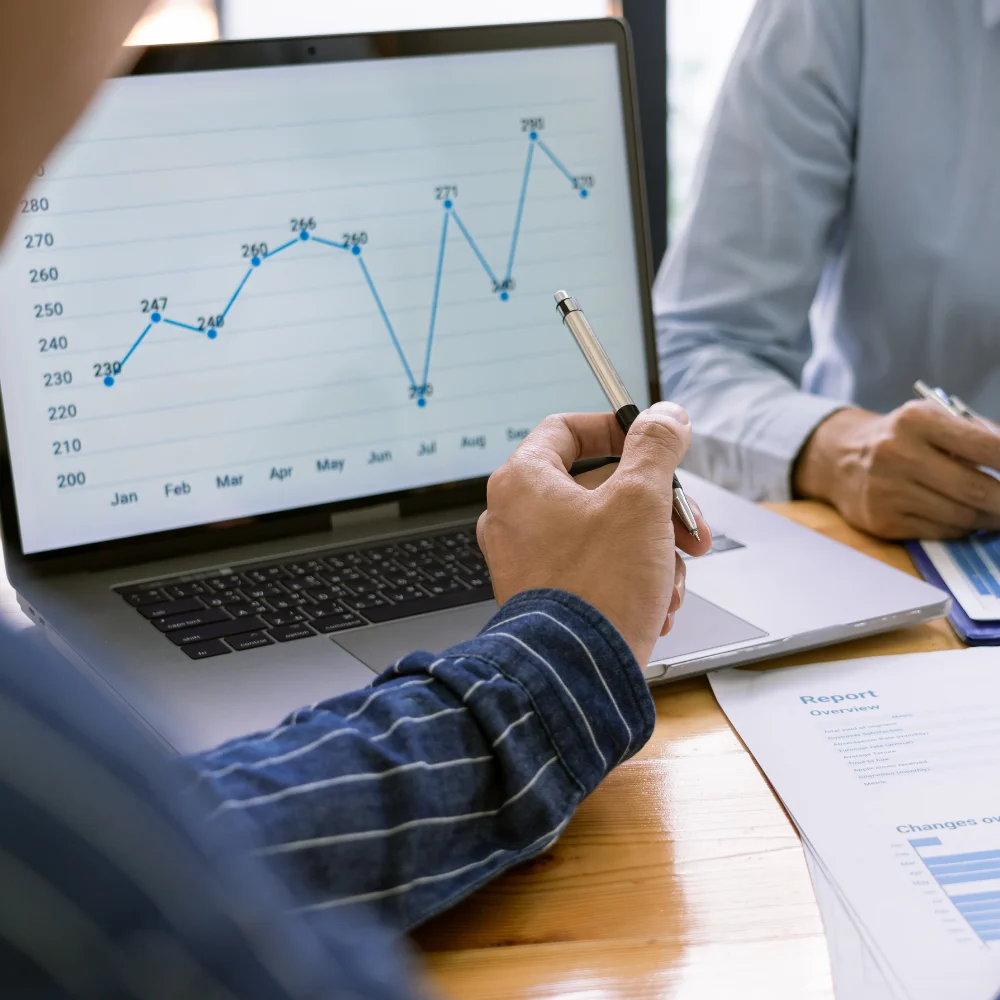 Business team reviewing company documents in a modern office