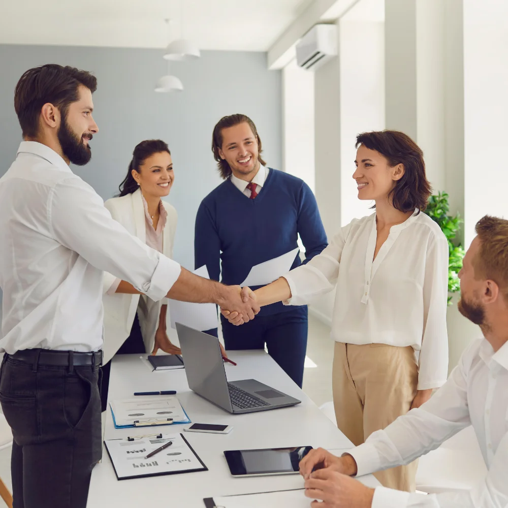 Business team reviewing company documents in a modern office